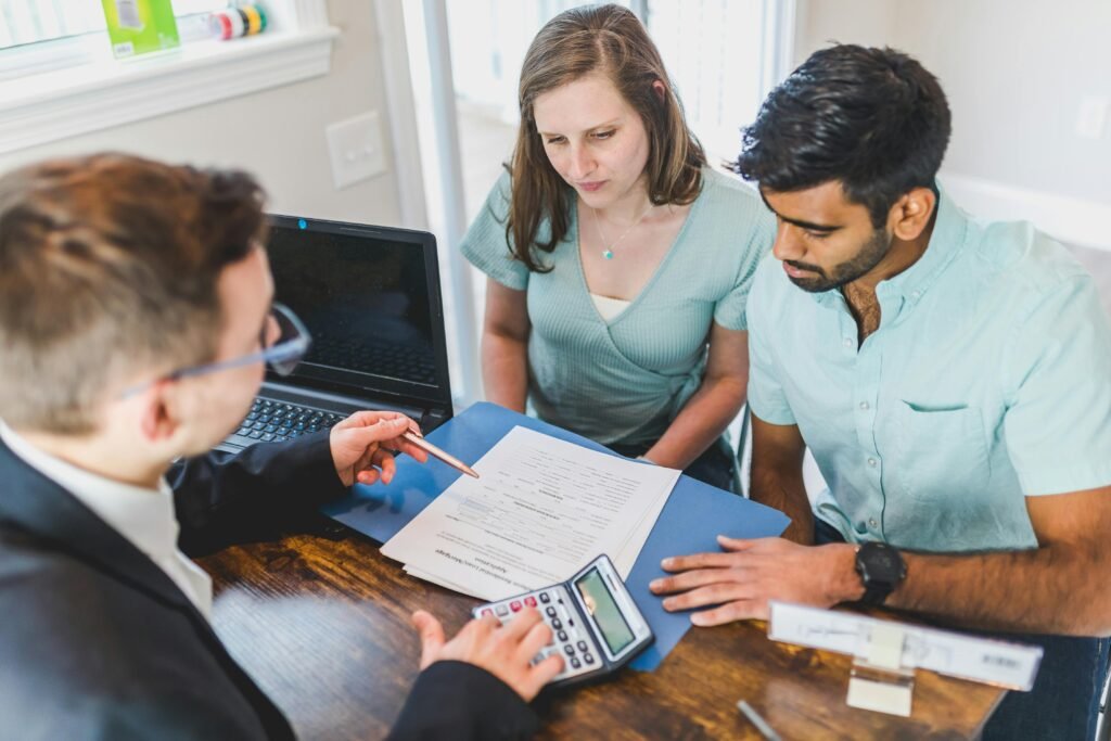 A financial advisor reviewing documents with a client